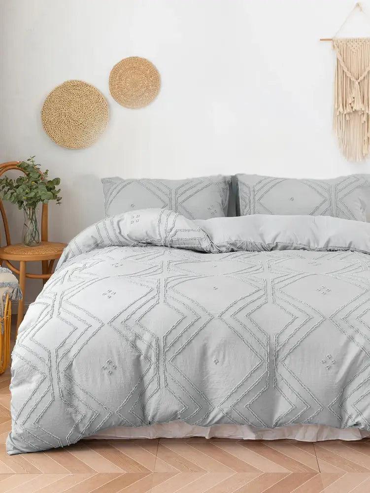 Light gray quilted microfiber duvet cover set with geometric embroidery pattern by DecorBites™ for soft comfort