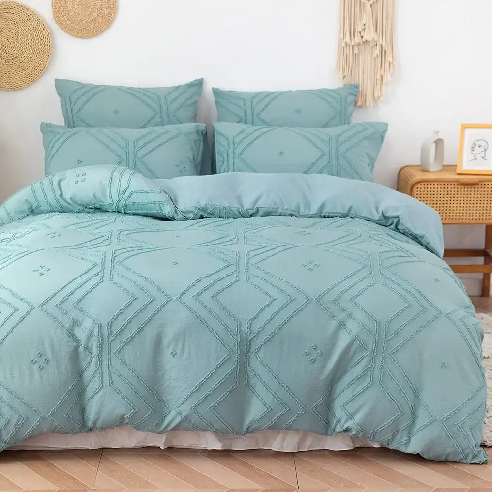 Teal-colored quilted microfiber duvet cover set with geometric embroidery pattern from decorbites soft tufted collection