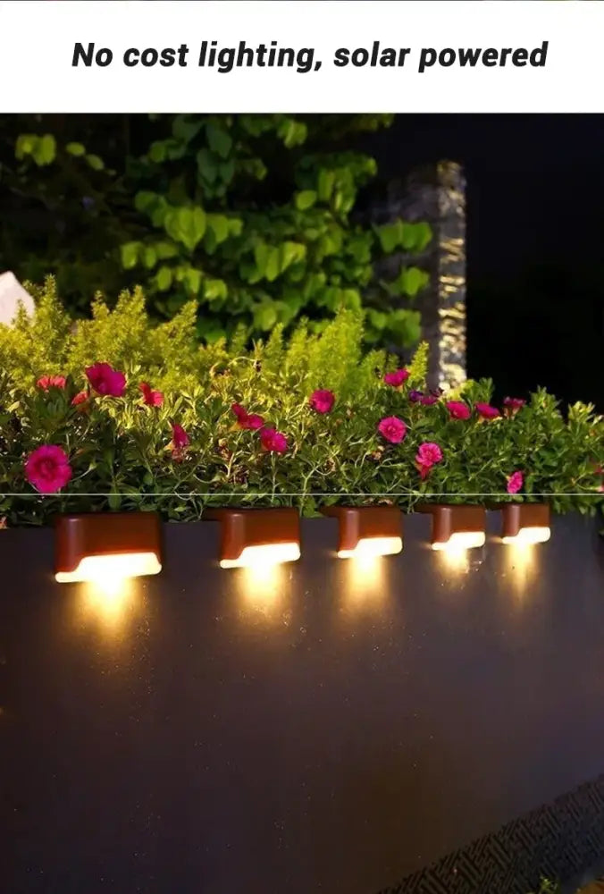 A row of sleek rectangular solar led outdoor stair lights with warm amber illumination from decorbites™