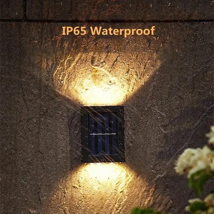 Black rectangular DecorBites™ solar led wall light with dual downward-facing lamp beads for outdoor use