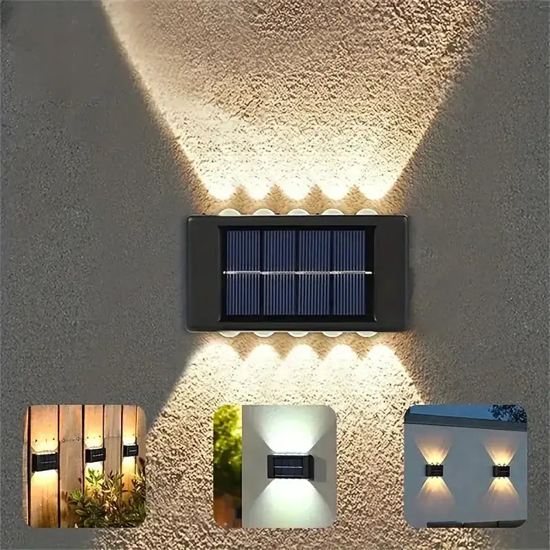 Black rectangular decorbites™ solar led outdoor wall light with multiple led bulbs emitting warm white illumination