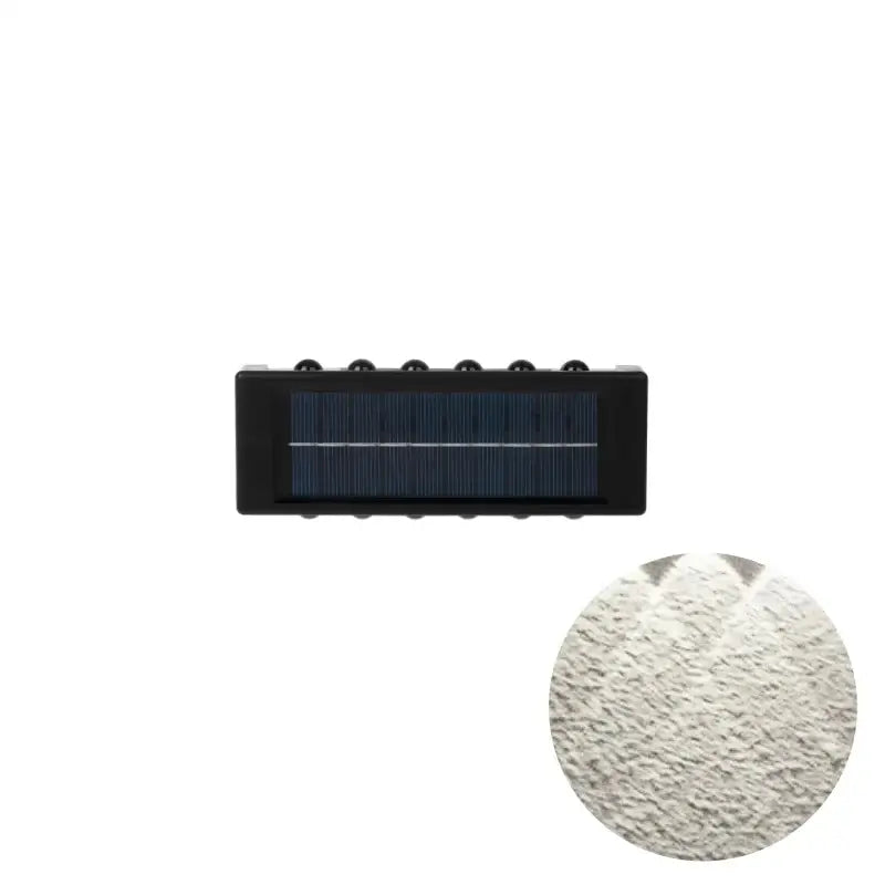 Black rectangular solar led outdoor wall light with textured white diffuser panel for garden and patio wall lights