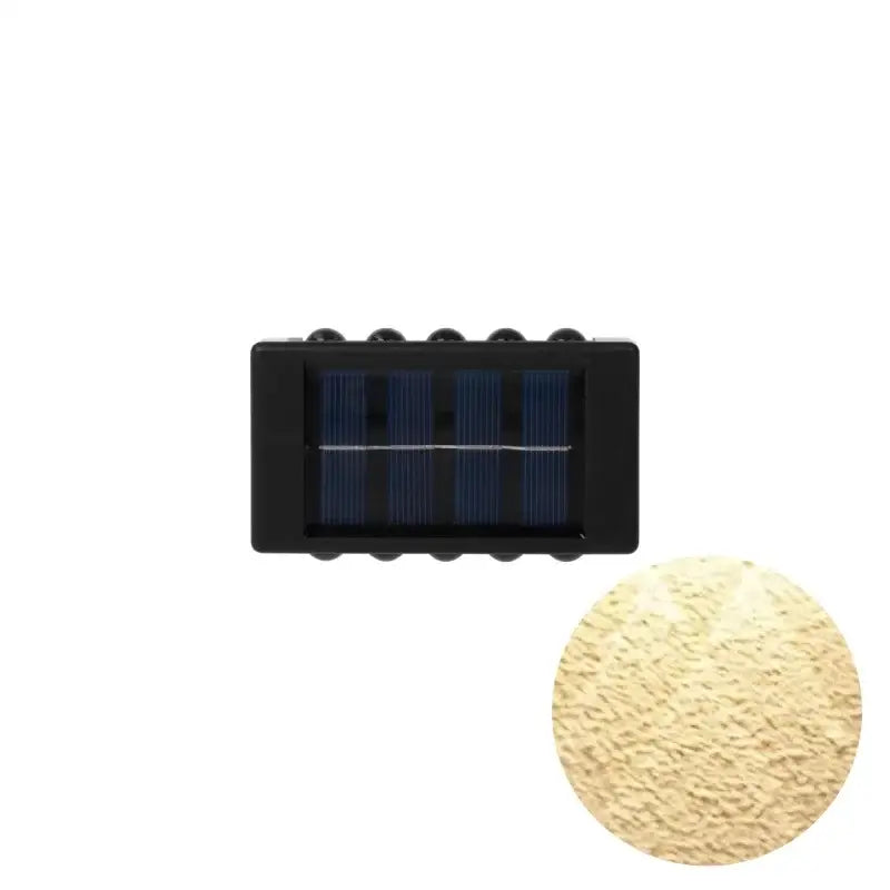 Black rectangular DecorBites™ solar led outdoor wall light with textured beige illuminated surface for garden use