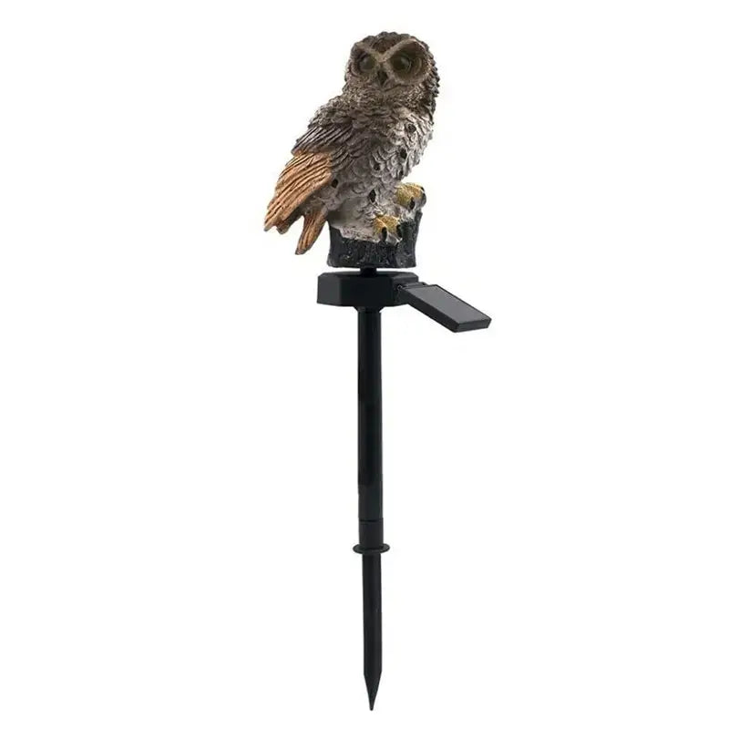 DecorBites™ solar owl garden light with a detailed brown and gray owl figurine on a black solar-powered stake