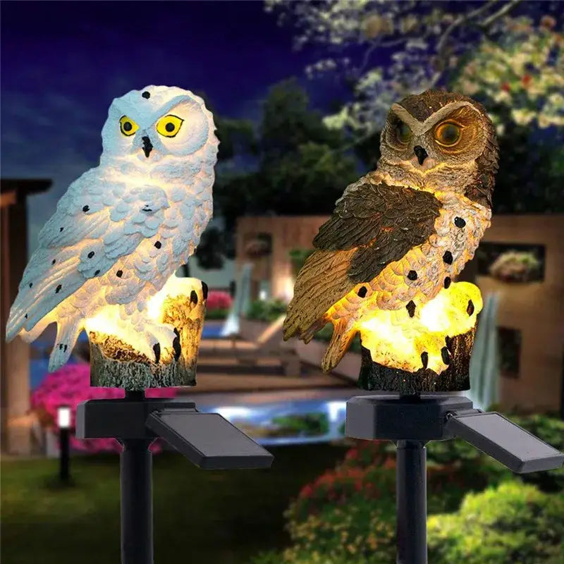 Decorbites™ solar owl garden light featuring two LED owl garden lights in white with black spots and brown with yellow illumination