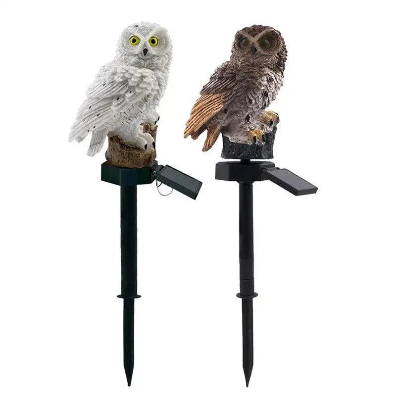 Two decorbites solar owl garden lights featuring white and brownish-gray designs with glowing yellow eyes and waterproof led illumination