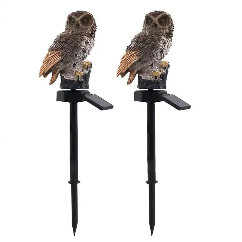 Decorbites™ solar owl garden light featuring two brown and gray feathered owls on black stakes with solar panels