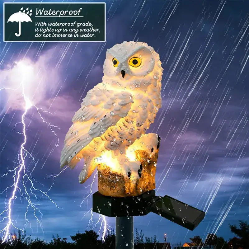 DecorBites™ solar owl garden light with glowing yellow eyes and textured feathers on a waterproof base