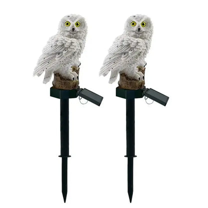 DecorBites solar owl garden light with white textured feathers yellow eyes and black stake for outdoor use
