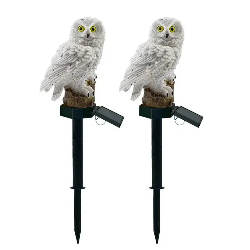 DecorBites solar owl garden light with white textured feathers yellow eyes and black stake for outdoor use