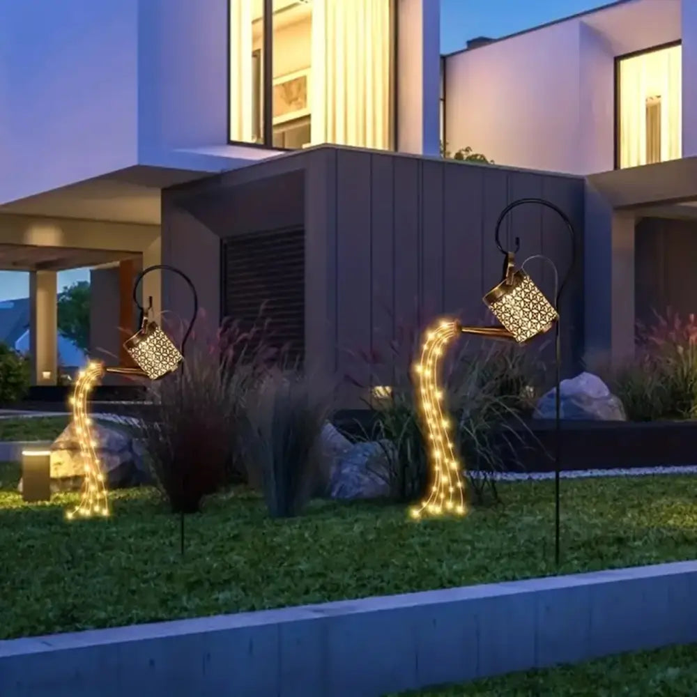 DecorBites™ gold-toned metal solar watering can light with geometric patterns and warm LED string for outdoor decor