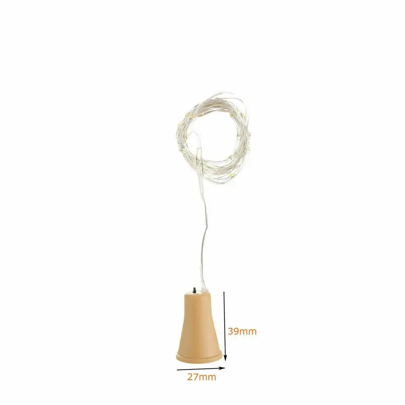 A beige conical base with coiled clear led fairy lights for solar wine bottle decoration by decorbites