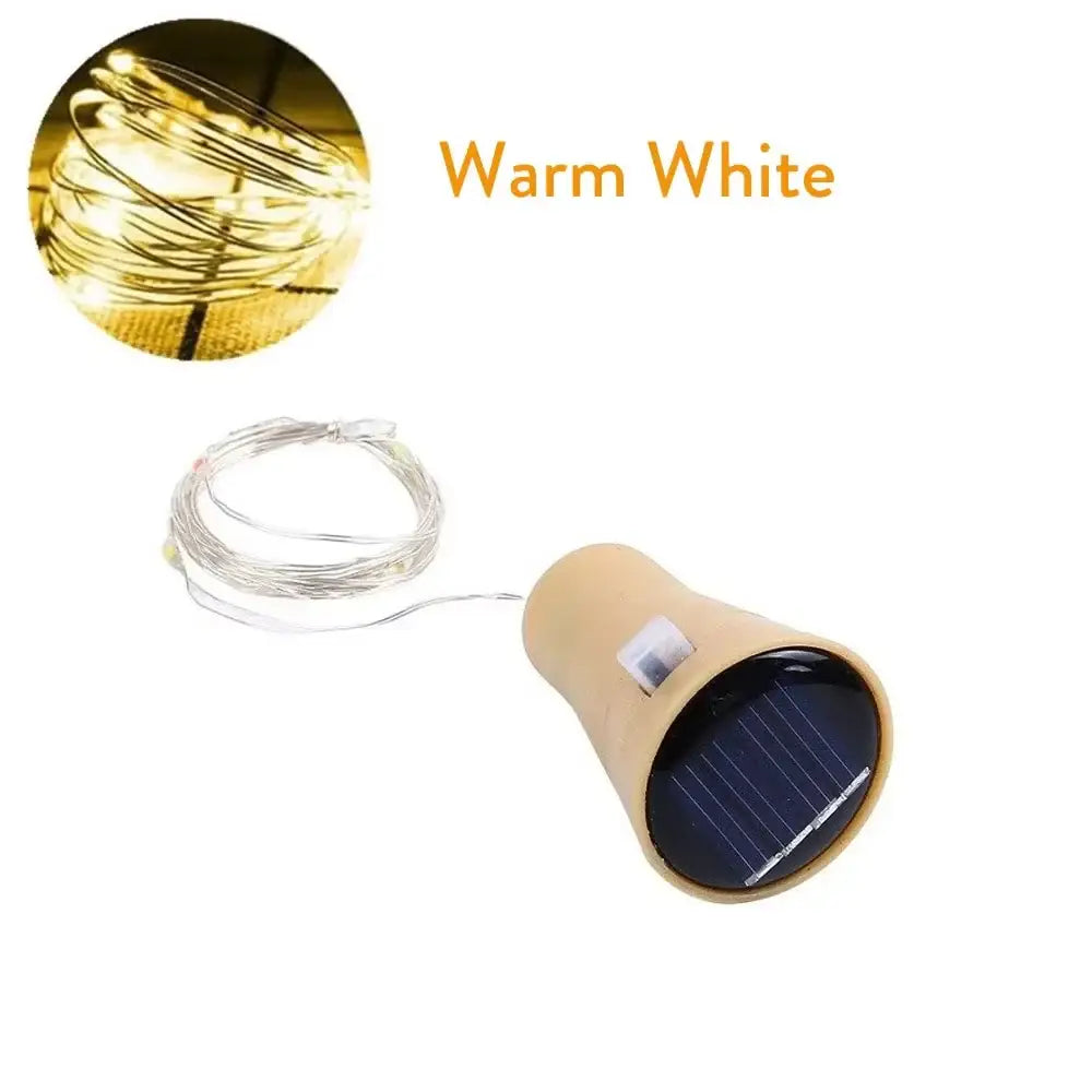 Warm white solar wine bottle string lights with beige cylindrical battery housing and thin wire by DecorBites