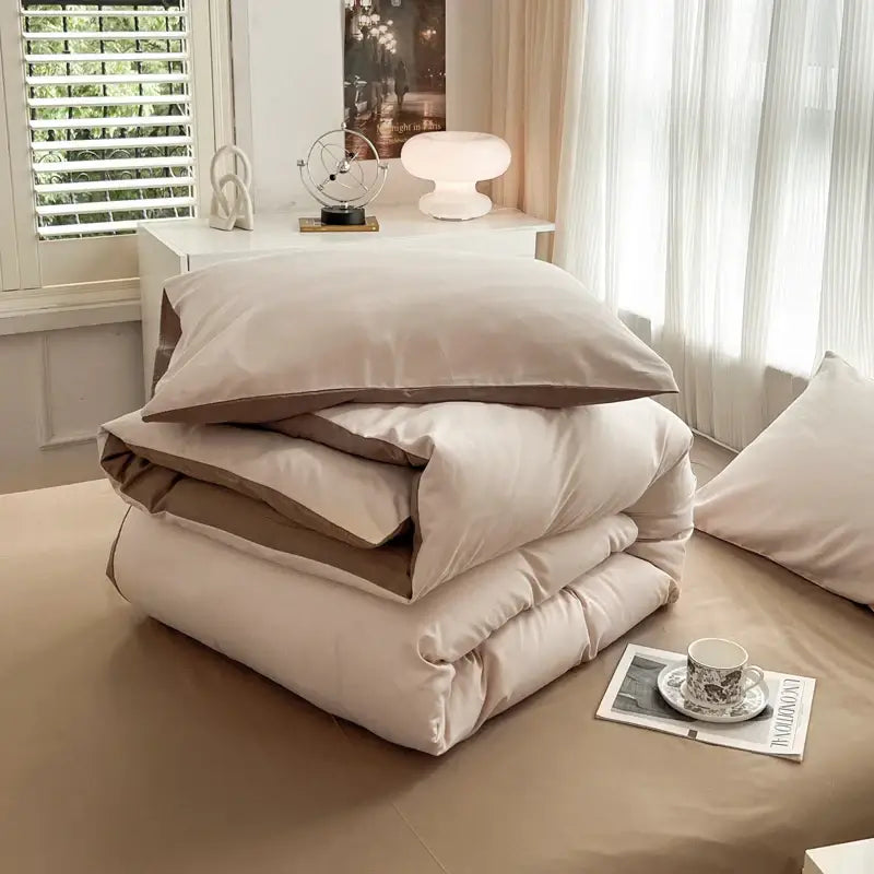 Beige and taupe two-toned solid color duvet cover set with soft brush fabric featuring a plush texture by DecorBites