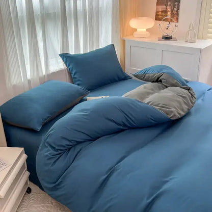 DecorBites™ solid color brush fabric duvet cover set in blue and gray with quilted comforter and plush fabric