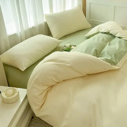 Cream-colored decorbites™ solid color brush fabric duvet cover with plush texture and matching light green pillowcases