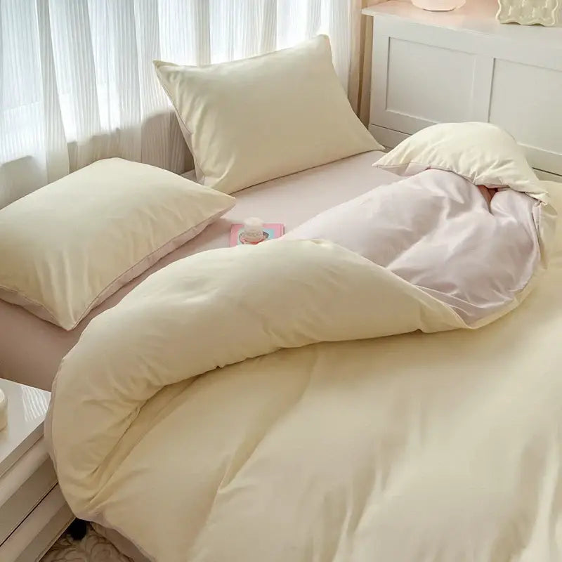 Cream-colored solid color duvet cover set with brush fabric cotton and subtle stitching by decorbites four pieces