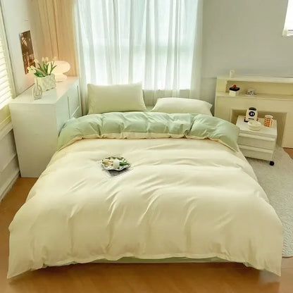 Cream-colored satin duvet cover set with solid color soft mint green brush fabric accent panel by decorbites