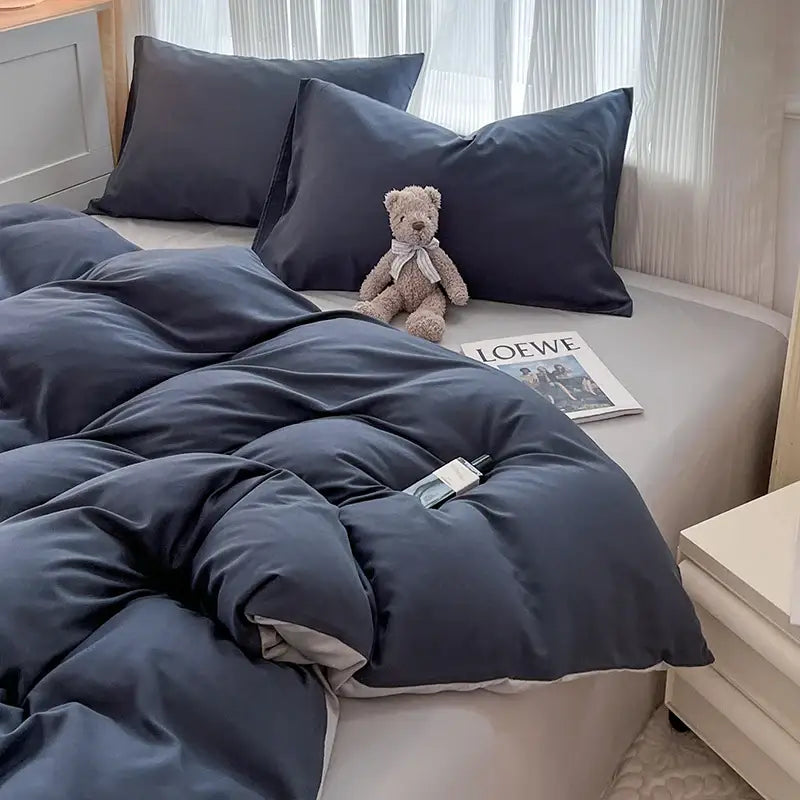 Dark blue solid color duvet cover set with matching pillows in soft textured brush fabric by DecorBites™