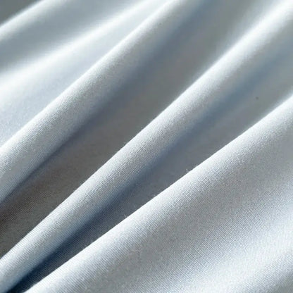 Light blue satin solid color brush fabric duvet cover with a smooth glossy finish from the decorbites bedding set