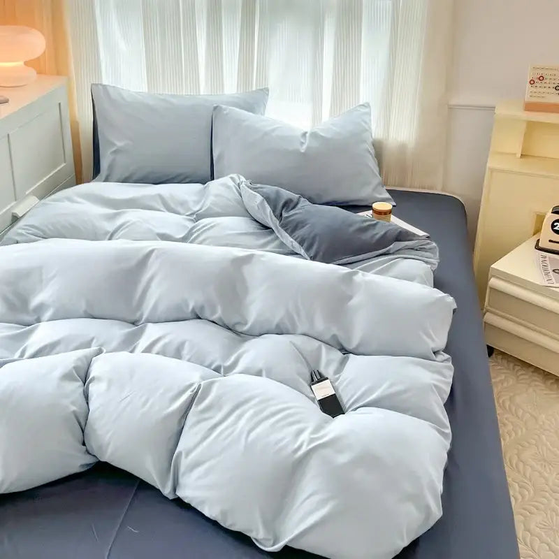 Light blue solid color quilted duvet cover with soft plush brush fabric from DecorBites 4 piece bedding set