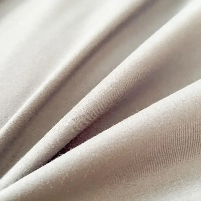 Soft off-white cotton brush fabric duvet cover with smooth texture and subtle sheen in DecorBites™ solid color bedding set
