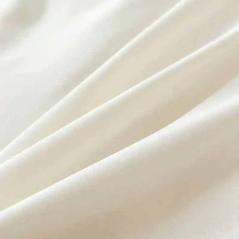 Soft creamy white duvet cover from decorbites™ solid color brush fabric bedding set with smooth glossy texture and folds