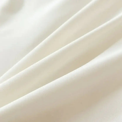 Soft creamy white duvet cover from decorbites™ solid color brush fabric bedding set with smooth glossy texture and folds