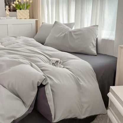 Soft gray solid color duvet cover and pillowcases in brush fabric with subtle sheen from DecorBites™ bedding set