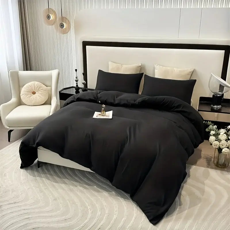 Black satin-like decorbites™ solid color brushed duvet cover set with smooth luxurious texture and subtle sheen