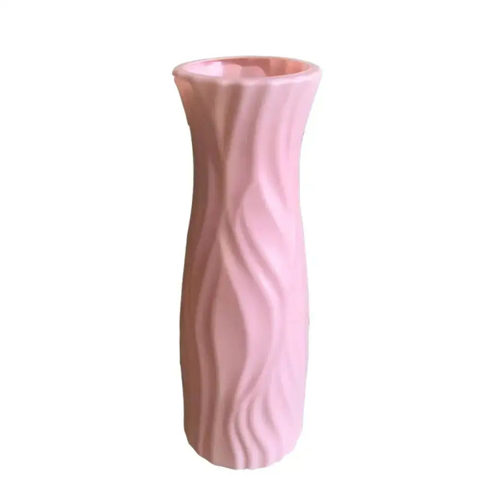 Decorbites™ solid color plastic flower vase in pink with smooth wavy texture and flared rim for home decor