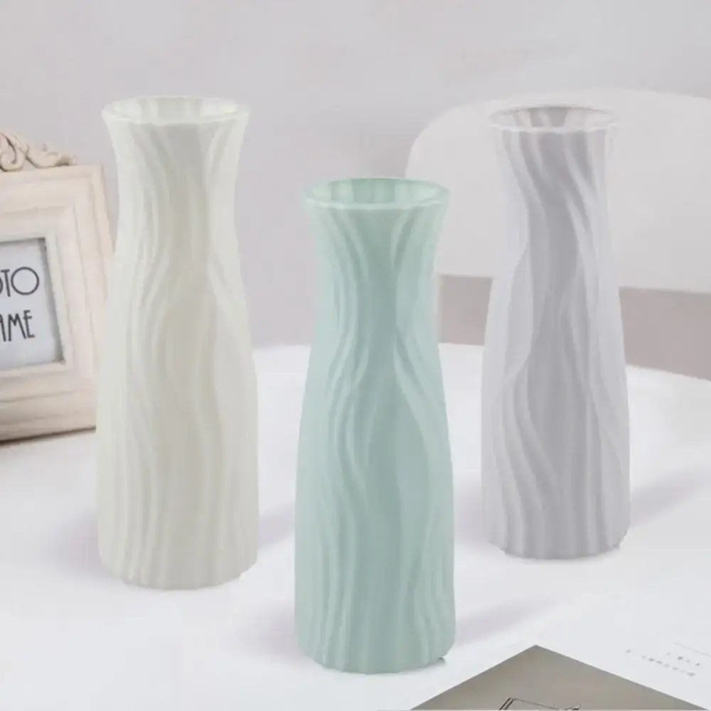 DecorBites™ solid color plastic flower vase set with three slender textured vases in off-white mint green and light gray