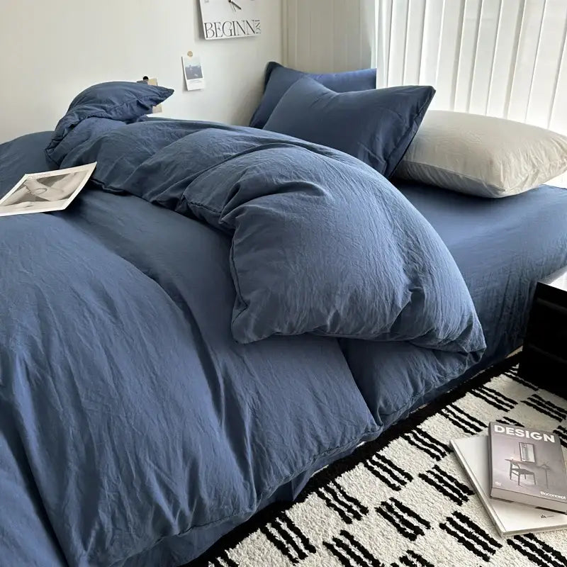 Blue linen duvet cover and matching pillows in a decorbites solid cotton bedding set with textured fabric finish