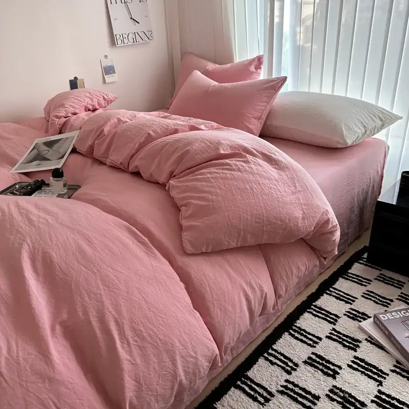Pink quilted duvet cover and matching pillows in decorbites™ solid cotton bedding set with soft textured fabric