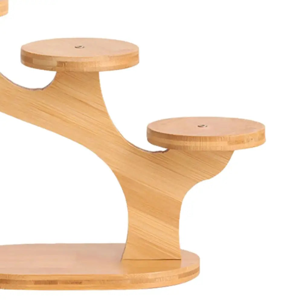 Light-colored bamboo tree-shaped DecorBites™ flower pot stand with two circular platforms for home and office use
