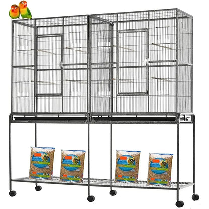 Black wrought iron double flight bird cage with breeding nest doors and multiple compartments on wheels by DecorBites