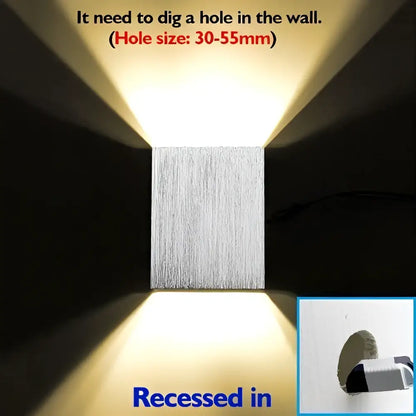 Silver rectangular wall sconces with brushed metal finish and warm white light from decorbites sphera wall sconces