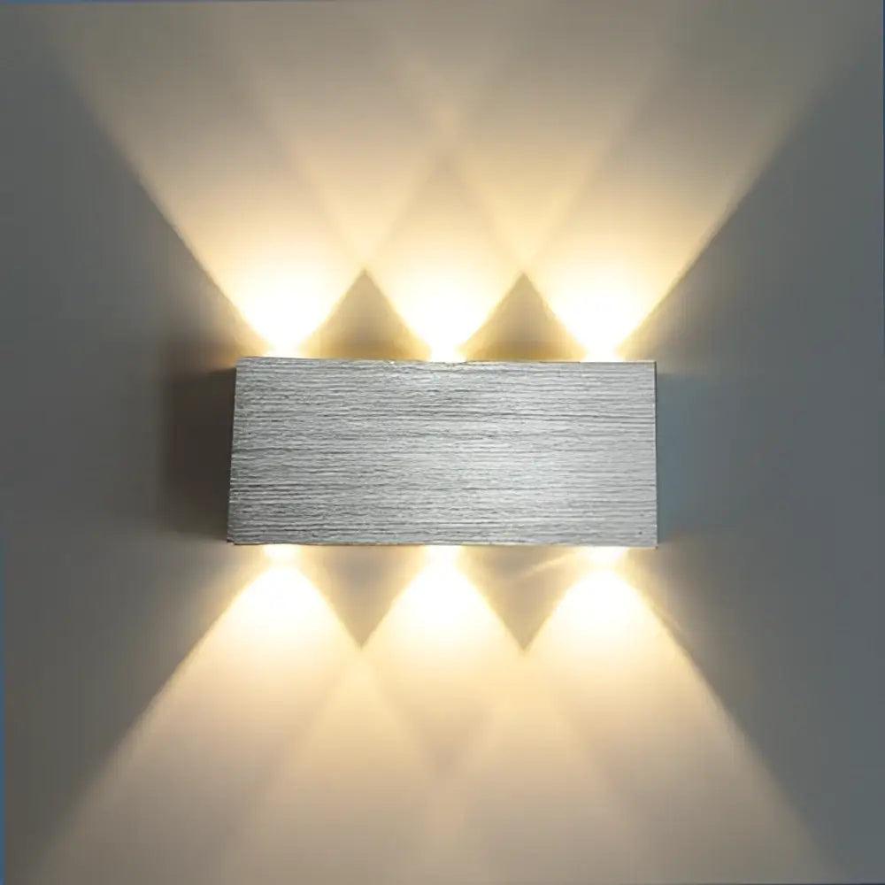 Silver rectangular wall sconce with brushed metal finish and four warm lights from DecorBites™ sphera wall sconces