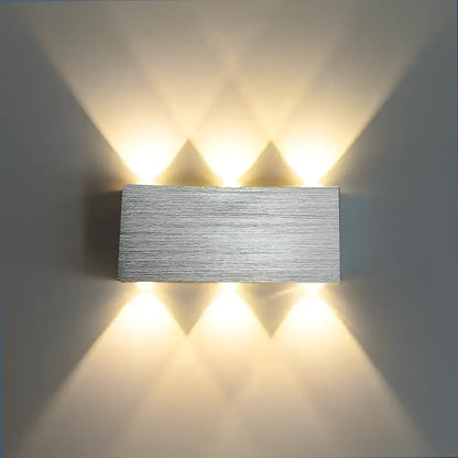 Silver rectangular wall sconce with brushed metal finish and four warm lights from DecorBites™ sphera wall sconces