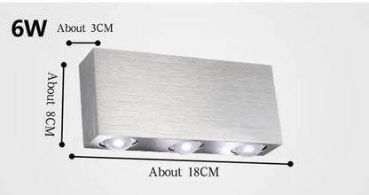 Silver brushed metal rectangular wall sconces with three embedded led bulbs from decorbites sphera wall collection