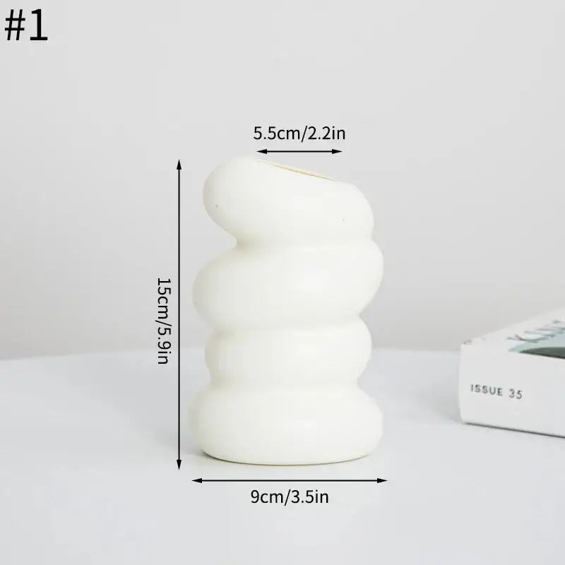 DecorBites™ spiral white vase in sleek ceramic with modern segmented rounded ridges for home decoration