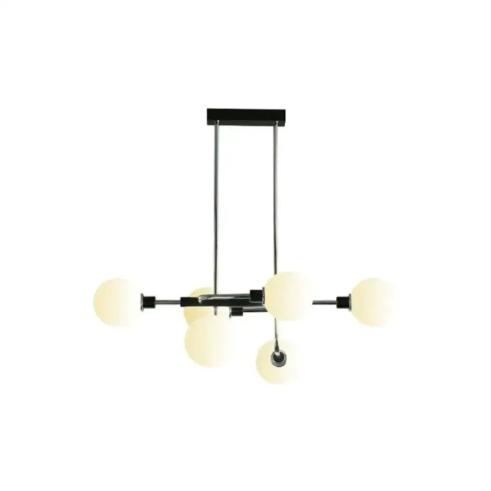 Modern black and chrome DecorBites™ sputnik hanging island light with frosted glass globes for dining room use