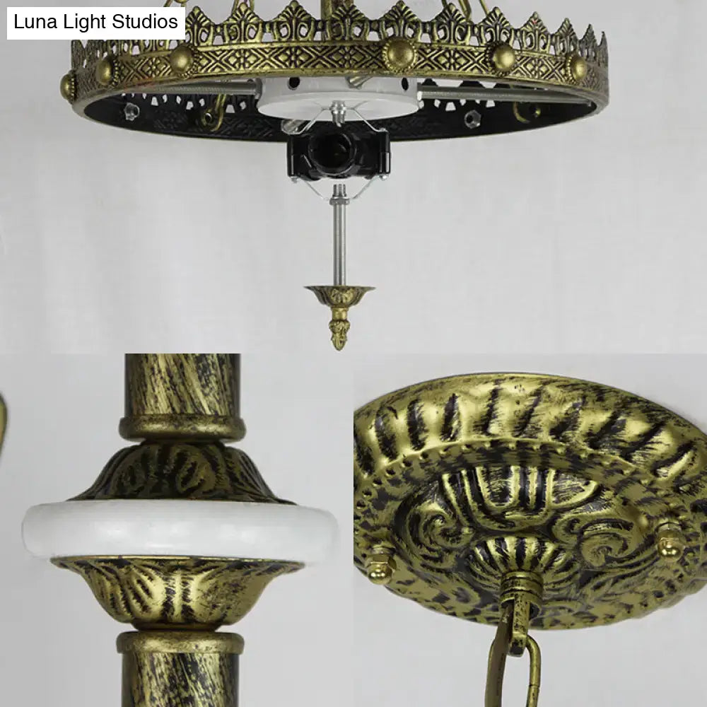 Antique brass ornate ceiling fixture with intricate filigree detailing and white marble accent for stained glass bowl pendant light lodge leaf design