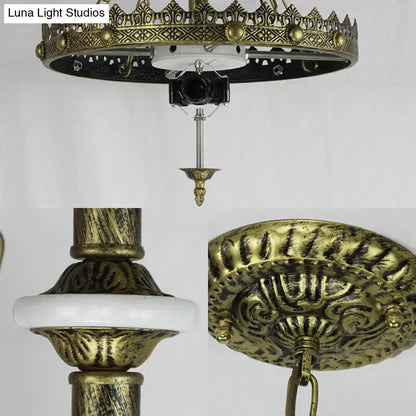 Antique brass ornate ceiling fixture with intricate filigree detailing and white marble accent for stained glass bowl pendant light lodge leaf design