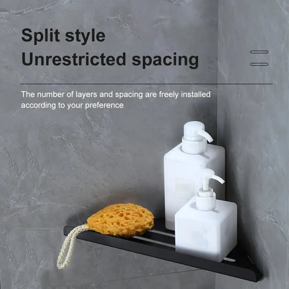 Black stainless steel DecorBites stainless steel corner shower shelf with unrestricted spacing holding pump bottles and sponge
