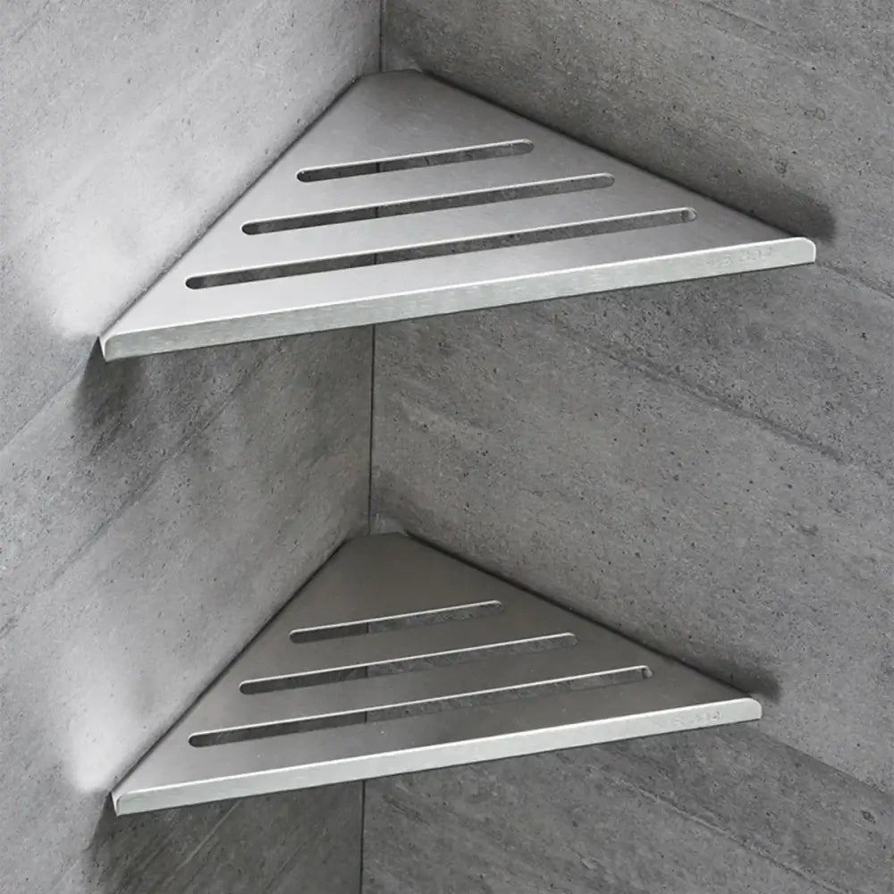 Decorbites stainless steel silver triangular corner shower shelf with horizontal slats and modern design