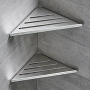 Decorbites stainless steel silver triangular corner shower shelf with horizontal slats and modern design