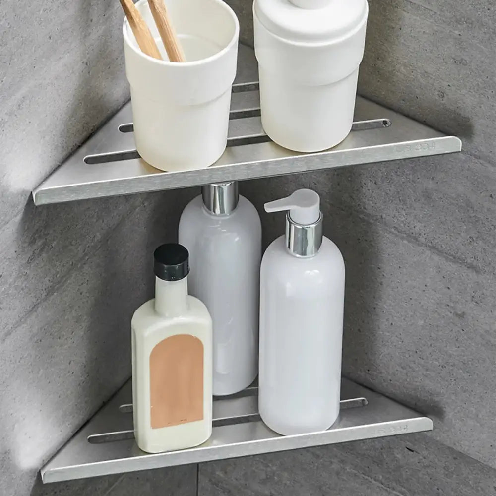Decorbites™ stainless steel corner shower shelf organizer with silver finish and sleek minimalist horizontal slats design
