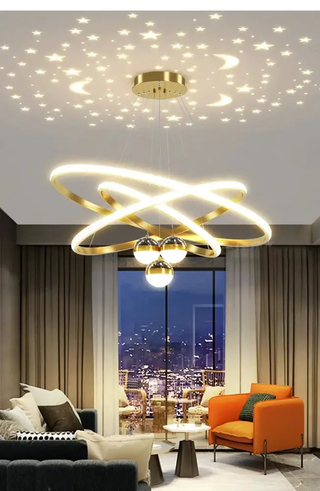 Decorbites starry sky led chandelier with gold-toned intertwined rings and three spherical bulbs for living room lighting