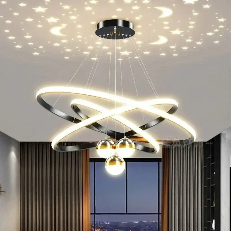 Modern black and gold led chandelier with interlocking rings and spherical lights for living room starry sky decor